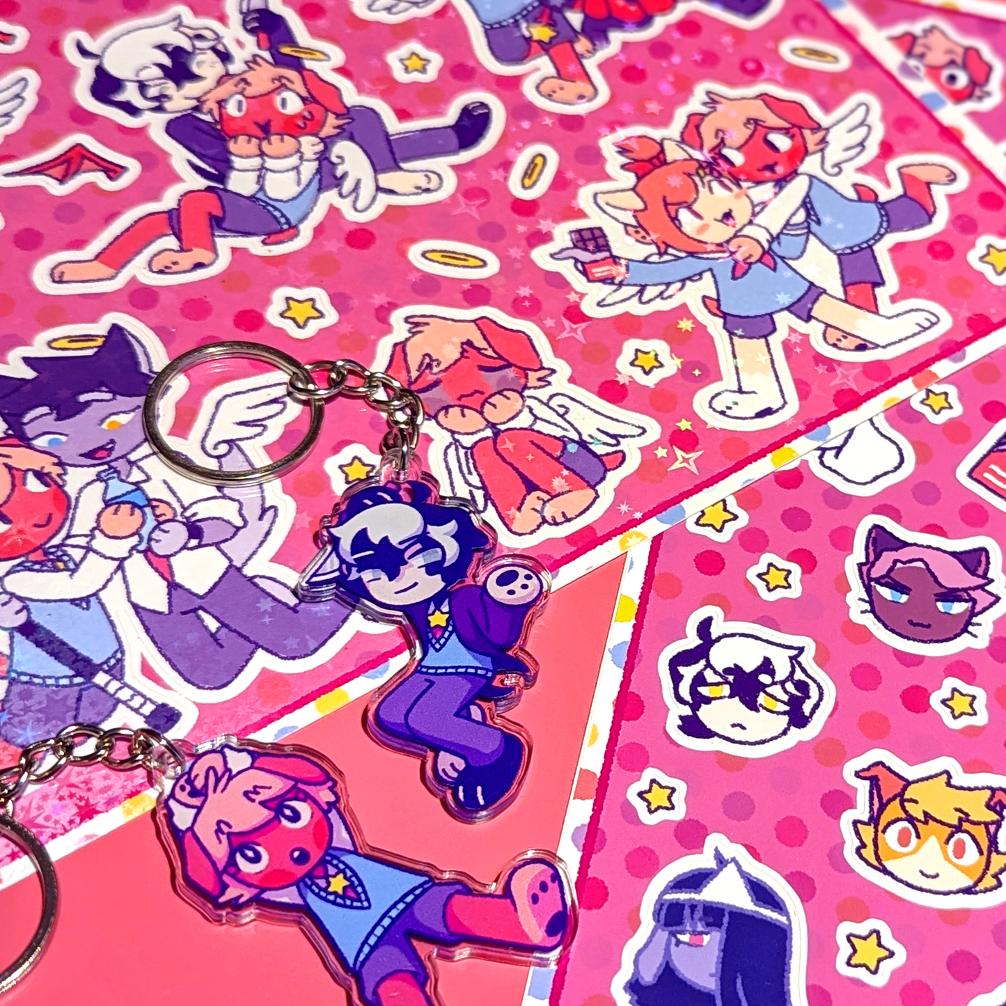 A Purrfect Apawcalypse Lil Puppy Merch Bundle made up of two sticker sheets and two keychains.